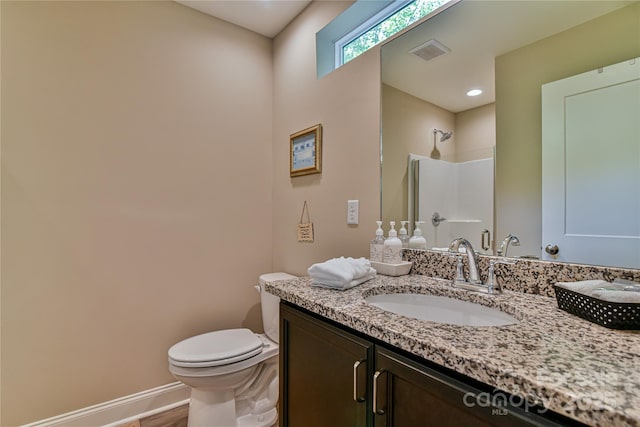 140 Atlantic Falls Trl, Black Mountain, NC 28711 - bathroom featuring toilet, vanity, a shower, baseboards, and wood finished floors