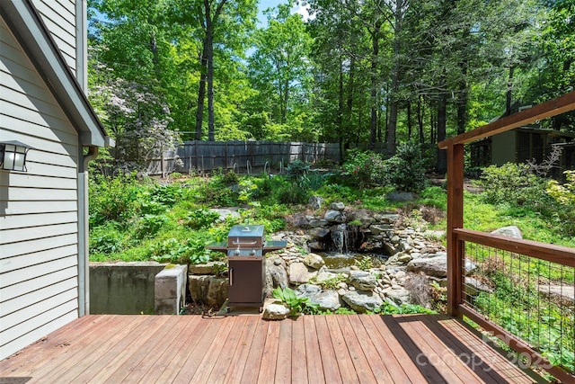 7 Western View St, Black Mountain, NC 28711 - wooden terrace featuring a fenced backyard, a grill, and a garden pond