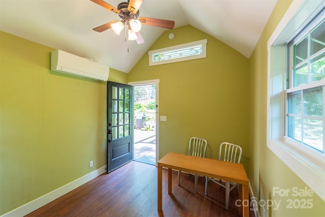 7 Western View St, Black Mountain, NC 28711 - dining space with a wall mounted AC, healthy amount of natural light, lofted ceiling, dark wood-style flooring, and baseboards