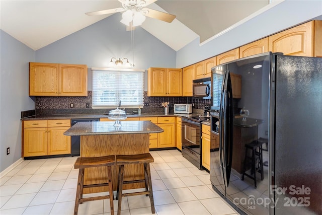 kitchen featuring black appliances, dark countertops, a ceiling fan, backsplash, and high vaulted ceiling