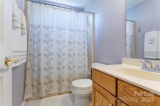 full bathroom featuring toilet, vanity, a shower with curtain, and tile patterned flooring