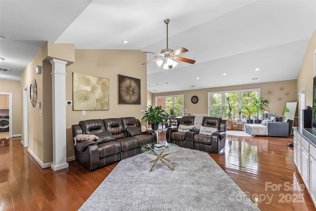 1825 Smyre Farm Rd, Newton, NC 28658 - living room with washer / clothes dryer, decorative columns, a ceiling fan, wood finished floors, and vaulted ceiling