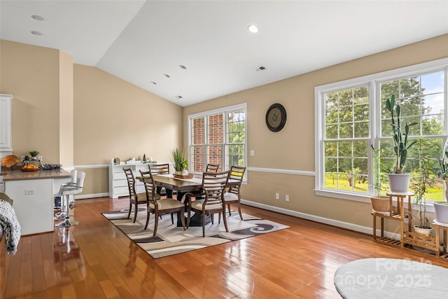 1825 Smyre Farm Rd, Newton, NC 28658 - dining space with light wood-style flooring, lofted ceiling, baseboards, and recessed lighting