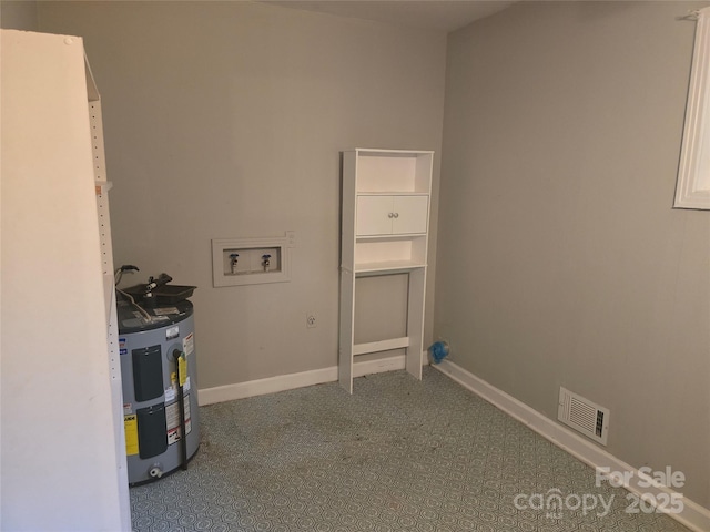 520 Crestview Dr, Albemarle, NC 28001 - washroom with washer hookup, water heater, and baseboards
