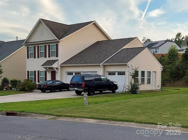 2061 Argentum Ave, Fort Mill, SC 29707 - traditional-style home with an attached garage, driveway, a front lawn, and roof with shingles