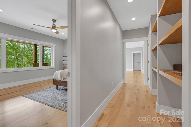 128 Saddle Ridge Dr, Alexander, NC 28701 - corridor with light wood-style floors and recessed lighting