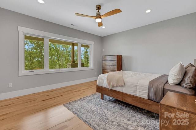128 Saddle Ridge Dr, Alexander, NC 28701 - bedroom with wood finished floors, recessed lighting, and ceiling fan