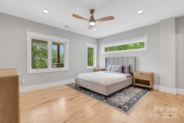 128 Saddle Ridge Dr, Alexander, NC 28701 - bedroom with wood finished floors, recessed lighting, and a ceiling fan