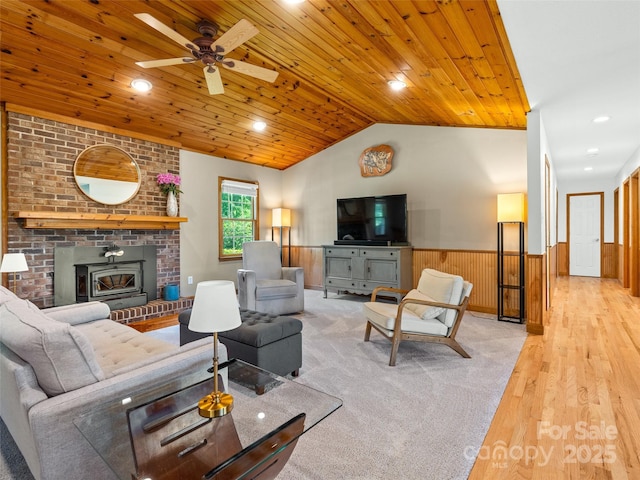 575 Upper Glady Fork Rd, Candler, NC 28715 - living area with a wainscoted wall, wood ceiling, wood finished floors, ceiling fan, and vaulted ceiling