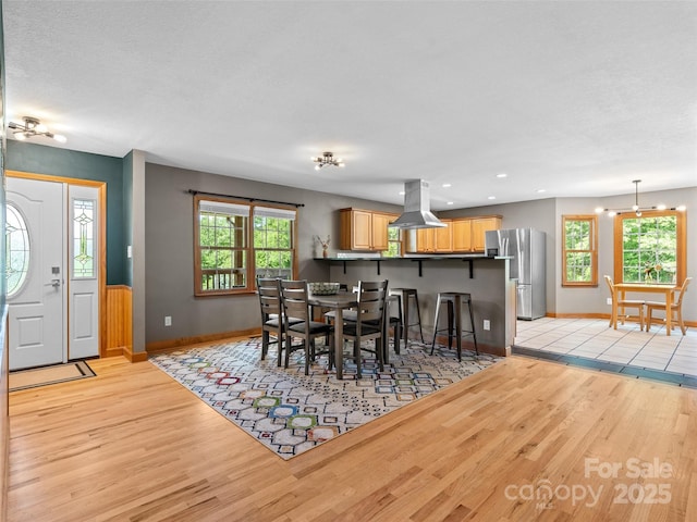 575 Upper Glady Fork Rd, Candler, NC 28715 - dining room with light wood-style floors, plenty of natural light, baseboards, and recessed lighting
