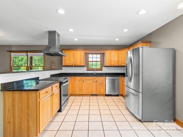 575 Upper Glady Fork Rd, Candler, NC 28715 - kitchen with stainless steel appliances, island range hood, a sink, recessed lighting, and dark stone countertops