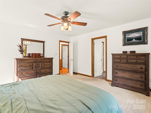 575 Upper Glady Fork Rd, Candler, NC 28715 - carpeted bedroom featuring baseboards and ceiling fan