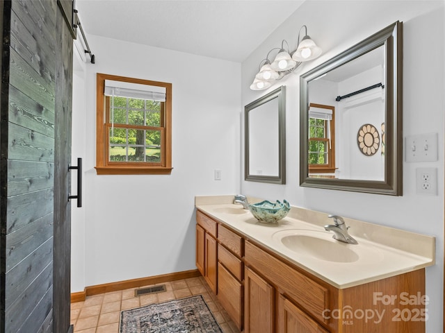 575 Upper Glady Fork Rd, Candler, NC 28715 - full bathroom with double vanity and baseboards
