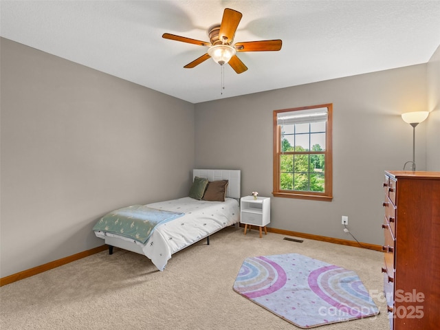575 Upper Glady Fork Rd, Candler, NC 28715 - bedroom featuring carpet, baseboards, and a ceiling fan
