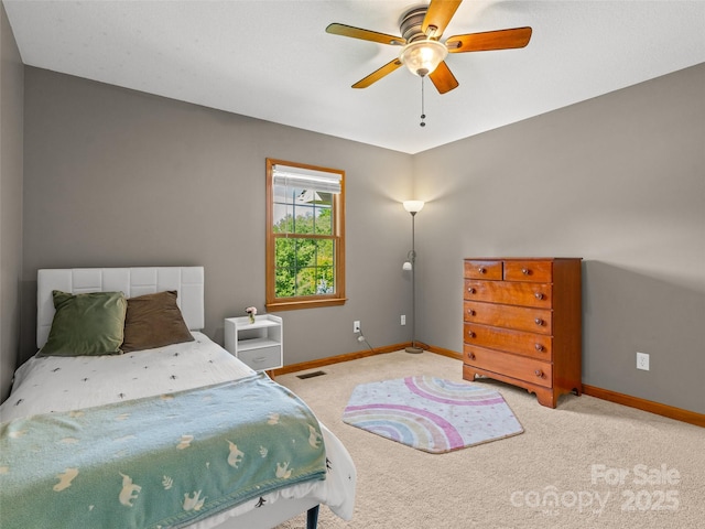 575 Upper Glady Fork Rd, Candler, NC 28715 - carpeted bedroom featuring baseboards and ceiling fan
