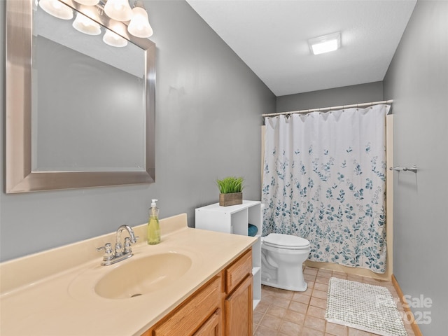 575 Upper Glady Fork Rd, Candler, NC 28715 - bathroom with vanity, toilet, tile patterned floors, and a shower with shower curtain