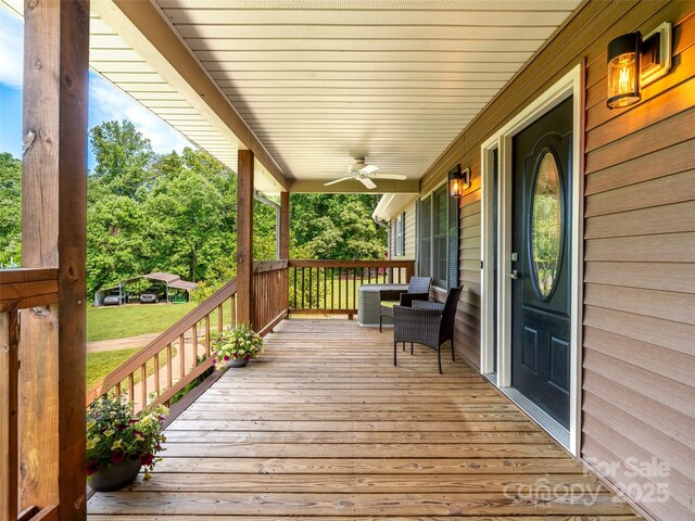 575 Upper Glady Fork Rd, Candler, NC 28715 - wooden porch featuring ceiling fan
