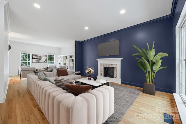 1134 Blueberry Ln, Charlotte, NC 28226 - living area with a brick fireplace, light wood-type flooring, and recessed lighting
