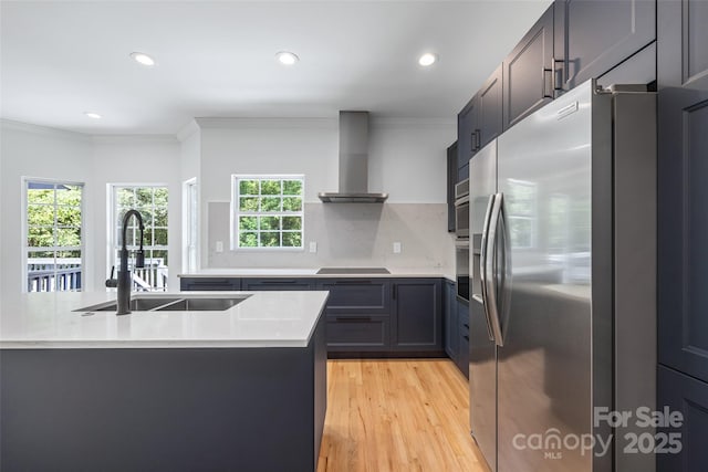 1134 Blueberry Ln, Charlotte, NC 28226 - kitchen featuring stainless steel fridge with ice dispenser, wall chimney exhaust hood, light wood-style flooring, ornamental molding, and recessed lighting