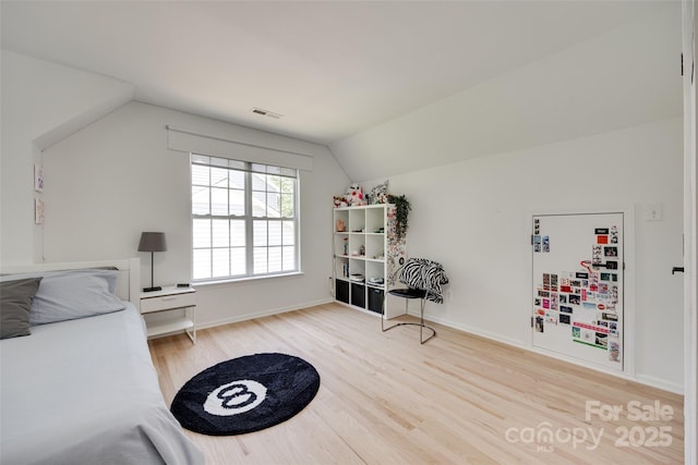 1134 Blueberry Ln, Charlotte, NC 28226 - interior space with wood finished floors and lofted ceiling