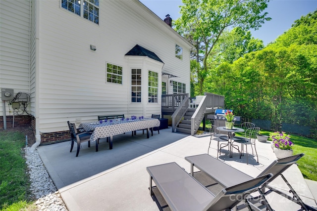 1134 Blueberry Ln, Charlotte, NC 28226 - view of patio / terrace featuring outdoor dining area and a deck