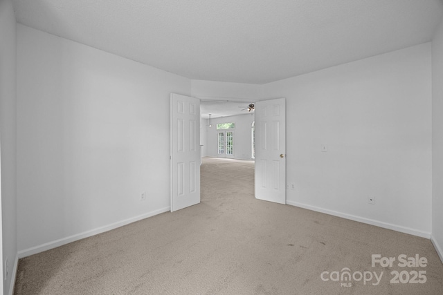 1321 Land Grant Rd, Charlotte, NC 28217 - carpeted empty room with baseboards