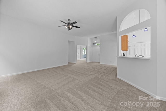 1321 Land Grant Rd, Charlotte, NC 28217 - unfurnished living room featuring carpet, a ceiling fan, and baseboards