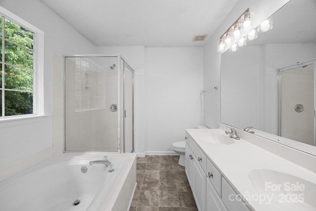 1321 Land Grant Rd, Charlotte, NC 28217 - bathroom with a shower stall, double vanity, toilet, and a bath