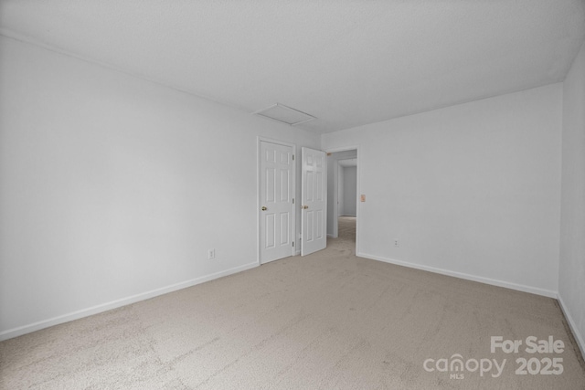 1321 Land Grant Rd, Charlotte, NC 28217 - carpeted spare room with attic access and baseboards
