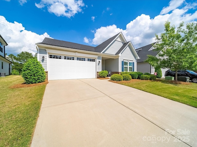 1456 Augustus Beamon Dr, Indian Trail, NC 28079 - view of front of home with a garage, driveway, a front lawn, and brick siding
