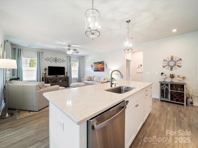 1456 Augustus Beamon Dr, Indian Trail, NC 28079 - kitchen featuring stainless steel dishwasher, a sink, a ceiling fan, healthy amount of natural light, and recessed lighting