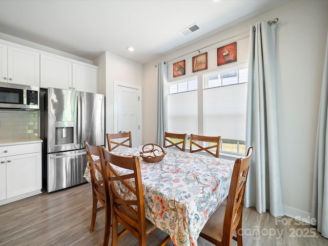 1456 Augustus Beamon Dr, Indian Trail, NC 28079 - dining space with light wood-style floors and recessed lighting