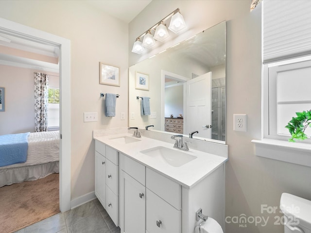 1456 Augustus Beamon Dr, Indian Trail, NC 28079 - full bathroom featuring connected bathroom, double vanity, baseboards, tile patterned flooring, and toilet