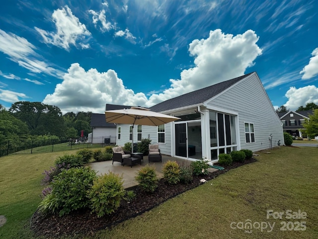 1456 Augustus Beamon Dr, Indian Trail, NC 28079 - back of house with a patio, a sunroom, and an outdoor hangout area