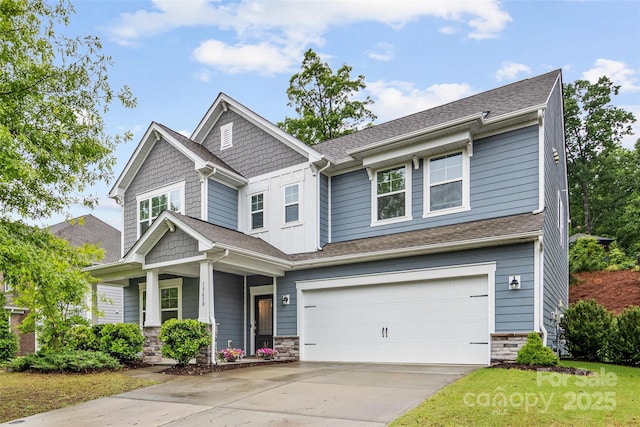 15630 Oleander Dr, Charlotte, NC 28278 - craftsman inspired home with a garage, concrete driveway, stone siding, covered porch, and roof with shingles