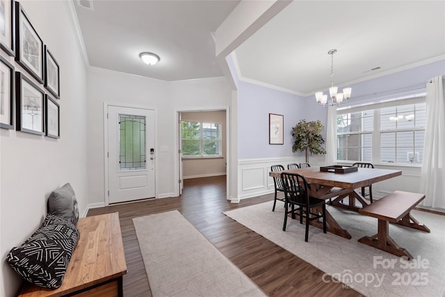 15630 Oleander Dr, Charlotte, NC 28278 - entryway featuring a chandelier, ornamental molding, and dark wood finished floors