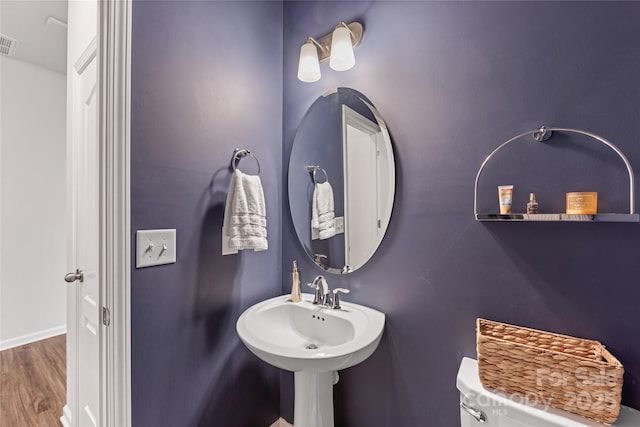 15630 Oleander Dr, Charlotte, NC 28278 - half bathroom featuring wood finished floors and baseboards