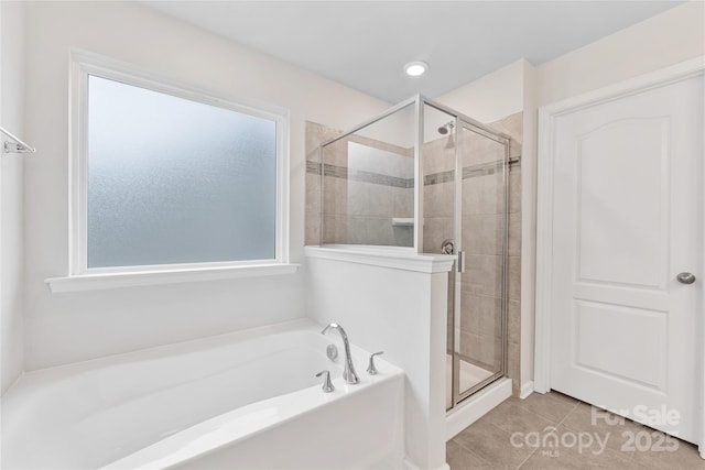 15630 Oleander Dr, Charlotte, NC 28278 - full bath featuring a shower stall, a bath, tile patterned flooring, and recessed lighting