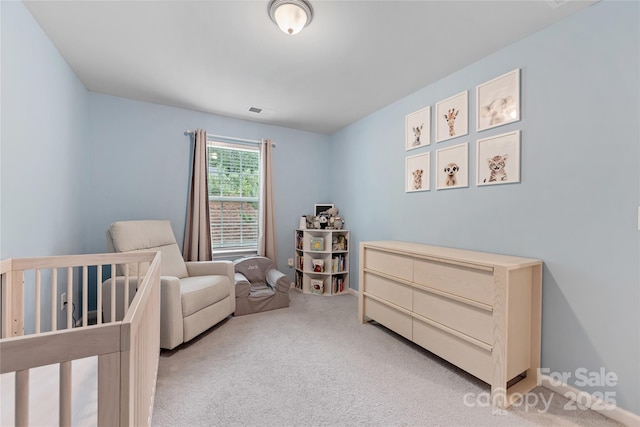 15630 Oleander Dr, Charlotte, NC 28278 - carpeted bedroom with a nursery area and baseboards