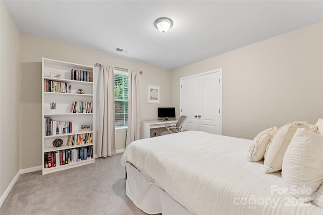 15630 Oleander Dr, Charlotte, NC 28278 - bedroom featuring baseboards, light carpet, and a closet