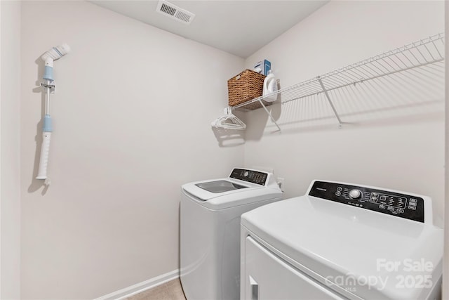 15630 Oleander Dr, Charlotte, NC 28278 - washroom featuring washer and clothes dryer and baseboards