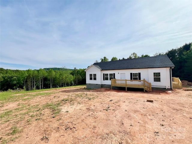 118 Brett Will Ct, Taylorsville, NC 28681 - rear view of house with crawl space, a wooden deck, a wooded view, and a shingled roof