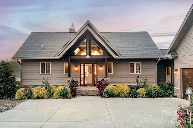 204 Ridge Dr Unit 12 12-1 12-2, Troy, NC 27371 - craftsman-style house with a chimney, a porch, and roof with shingles