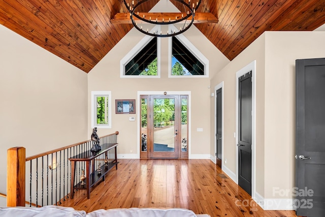 204 Ridge Dr Unit 12 12-1 12-2, Troy, NC 27371 - foyer entrance featuring a chandelier, hardwood / wood-style floors, wood ceiling, baseboards, and high vaulted ceiling