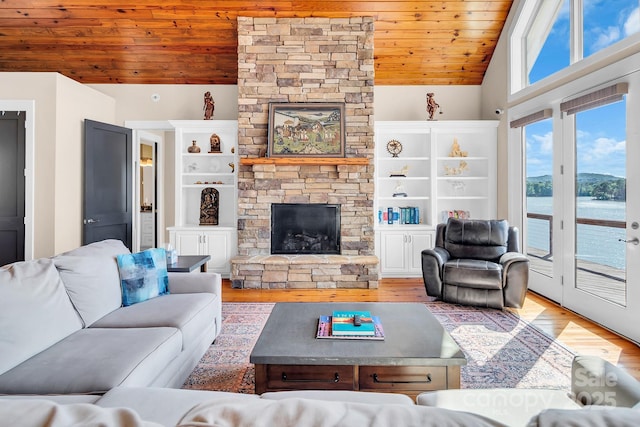 204 Ridge Dr Unit 12 12-1 12-2, Troy, NC 27371 - living area featuring vaulted ceiling, wooden ceiling, wood finished floors, and a fireplace