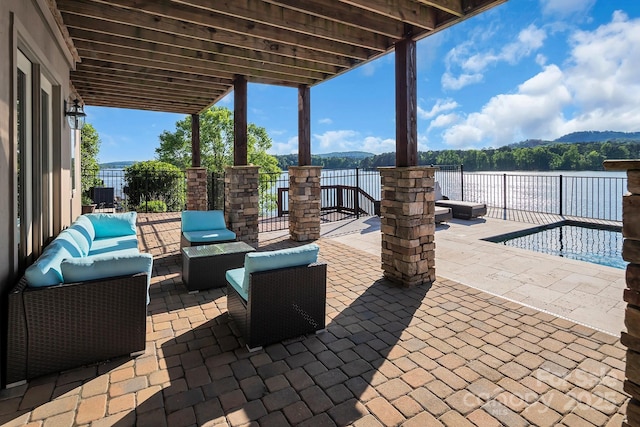 204 Ridge Dr Unit 12 12-1 12-2, Troy, NC 27371 - view of patio / terrace featuring an outdoor hangout area and a water view