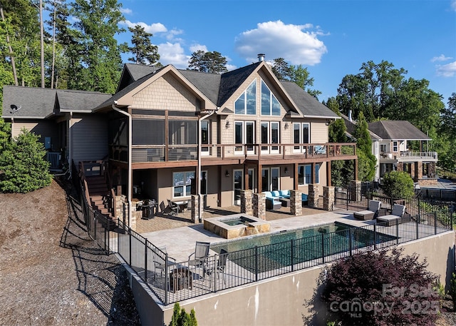 204 Ridge Dr Unit 12 12-1 12-2, Troy, NC 27371 - back of property with outdoor lounge area, stairs, a patio area, fence, and cooling unit