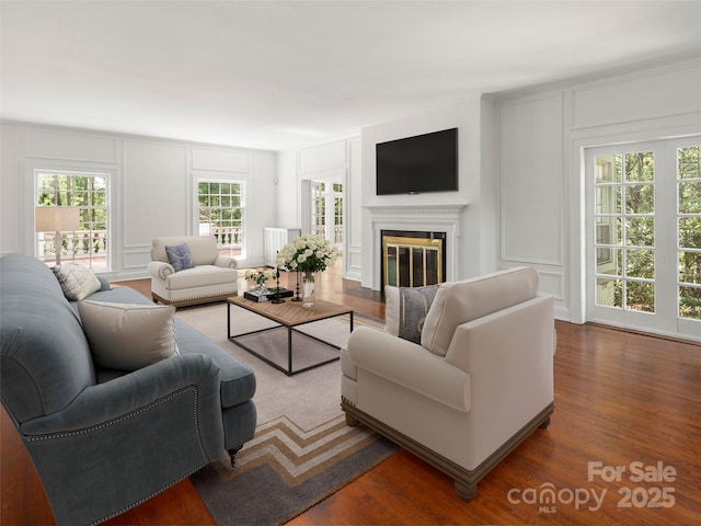 316 Vanderbilt Rd, Asheville, NC 28803 - living area with a decorative wall, dark wood finished floors, and a glass covered fireplace