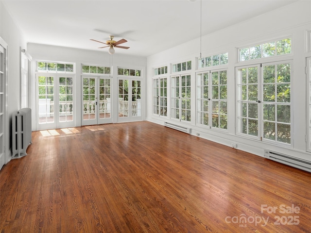 316 Vanderbilt Rd, Asheville, NC 28803 - unfurnished sunroom featuring radiator, french doors, plenty of natural light, and a baseboard heating unit