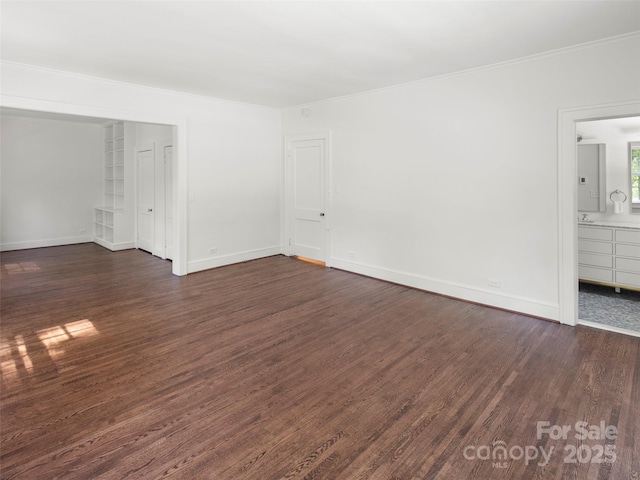 316 Vanderbilt Rd, Asheville, NC 28803 - spare room with dark wood finished floors, crown molding, and baseboards